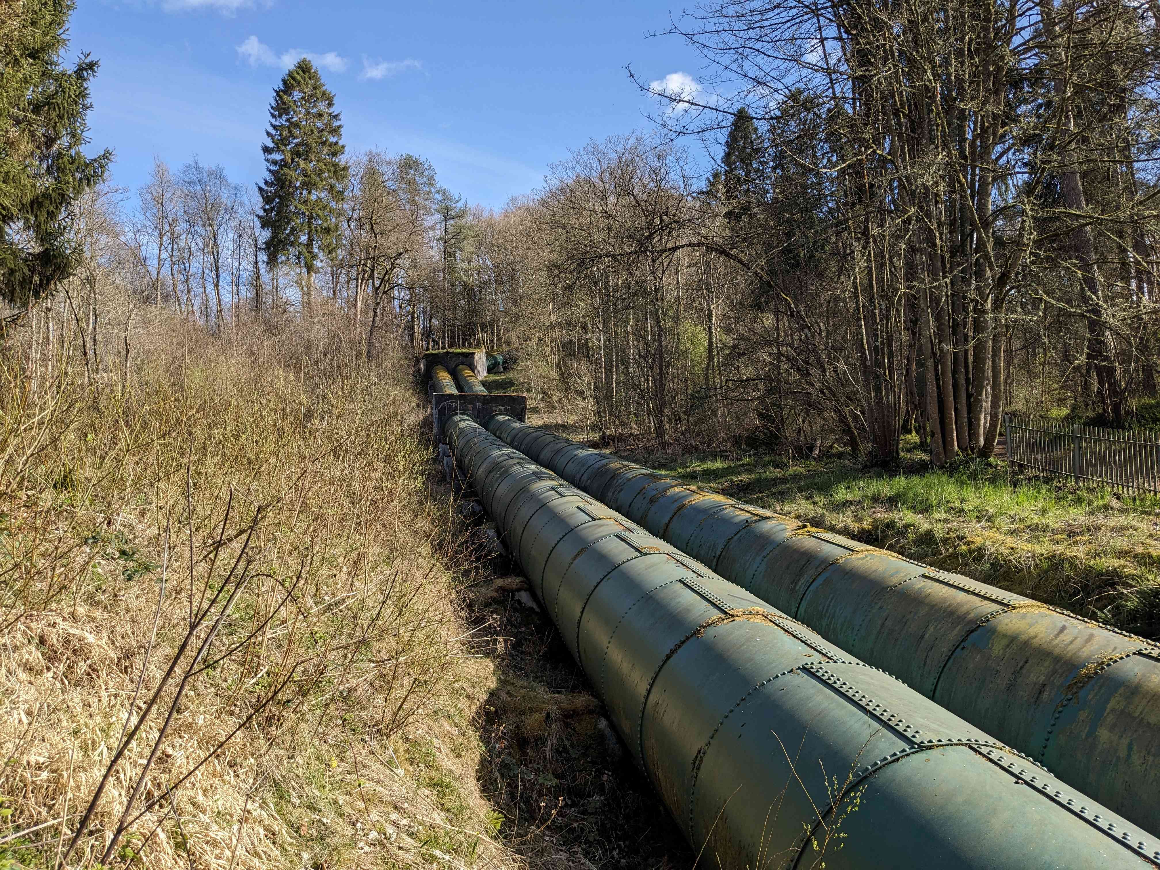 2-meter diameter pipes (penstocks) carry water from the surge tank to the turbines at Bonnington.