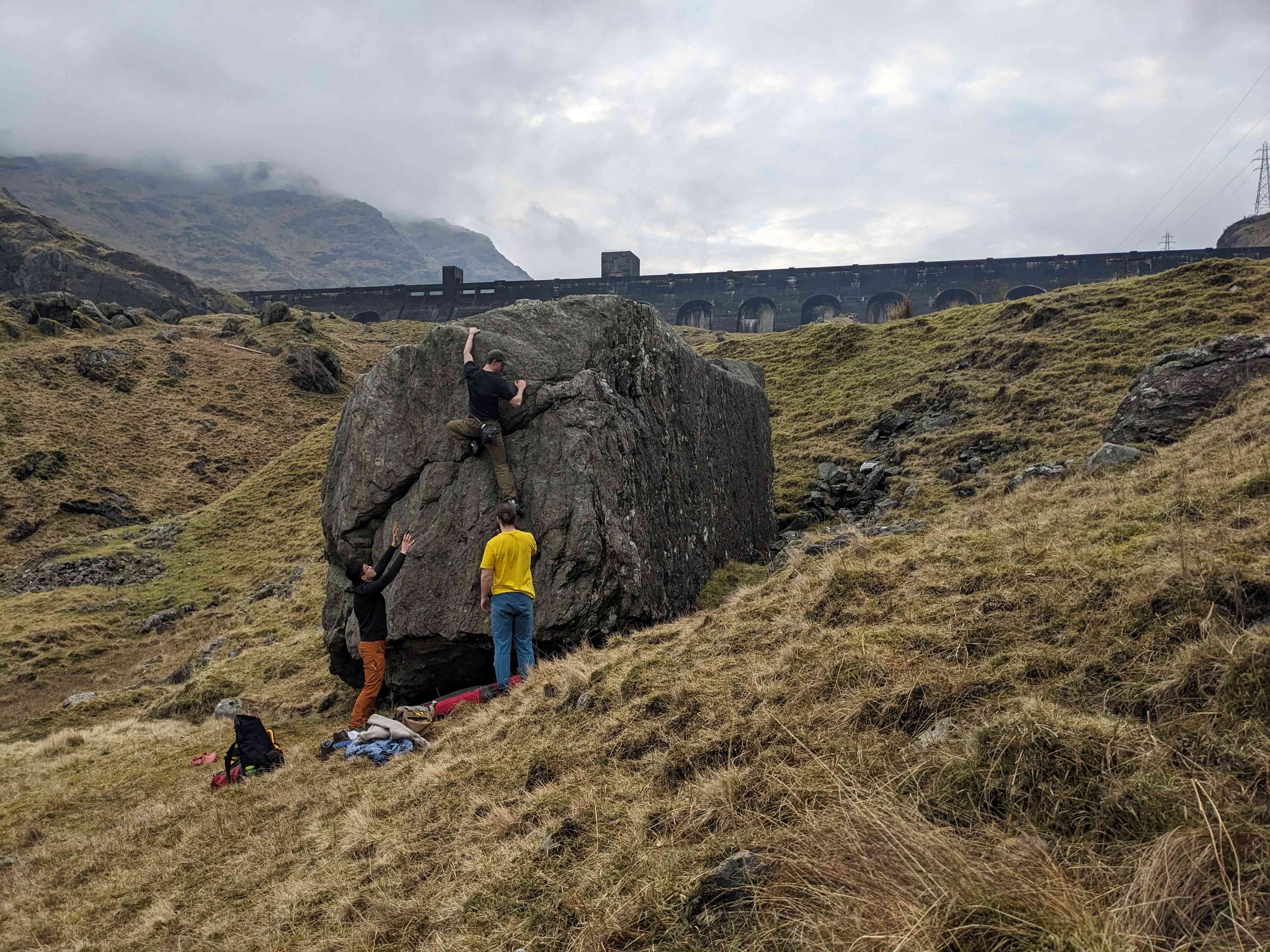 Bouldering beside the imposing Sloy dam. I believe in thoroughly exploring my research topics.
